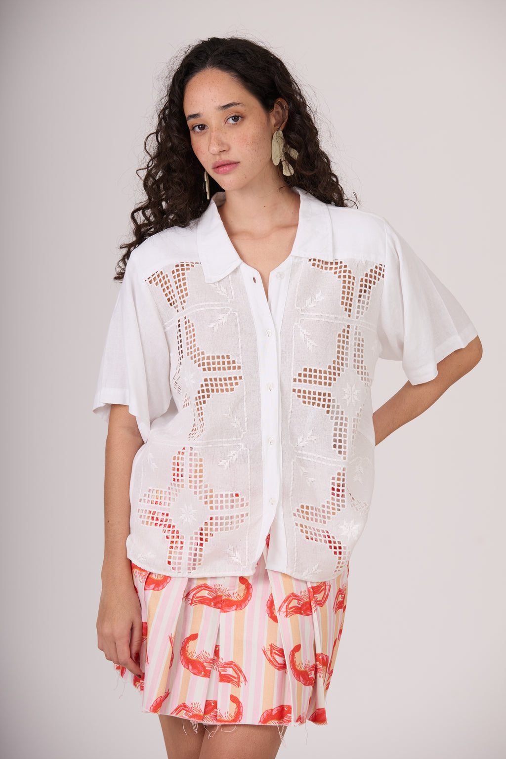 Camisa entre artes
